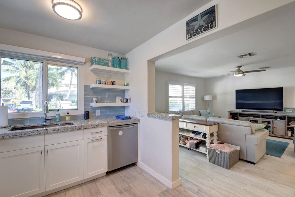 Photo of 1020 Casuarina Road, Delray Beach, FL 33483 (MLS # B26025656)