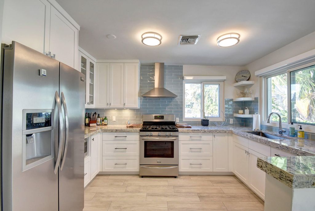 Photo of 1020 Casuarina Road, Delray Beach, FL 33483 (MLS # B26025656)