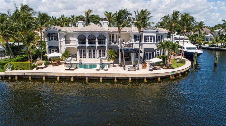 Important Tropical Georgian-inspired Intracoastal Point Estate sited on 245± ft of wraparound waterfrontage for a mega yacht.   Originally a creation of Marc-Michaels with magnificent interior  design of limestone, hardwood and handsome raised paneling and unique architectural detailing throughout.  Resort-like pool patio and lanai with professional summer kitchen and fireplace.  Shown By Appointment Only. DISCLAIMER: The written and verbal information provided including but not limited to prices, measurements, square footages, lot sizes, calculations and statistics have been obtained and conveyed from third parties such as the applicable Multiple Listing Service, public records as well as other sources. All information including that produced by the Sellers or Listing Company are subject to errors, omissions or changes without notice and should be independently verified by any prospect for the purchase of a Property.  The Sellers and Listing Company expressly disclaim any warranty or representation regarding all information.  Prospective purchasers' use of this or any written and verbal information is acknowledgement of this disclaimer and that Prospects shall perform their own due diligence.  Prospective purchasers shall not rely on any written or verbal information provided when entering a contract for sale and purchase.  Some affiliations may not be applicable to certain geographic areas. If your property is currently listed with another agent, please do not consider this a solicitation for the listing. In the event a Buyer defaults, no commission will be paid to either Broker on the Deposits retained by the Seller.  "No Commissions Paid until Title Passes."  Copyright 2019 Listing Company. All Rights Reserved.