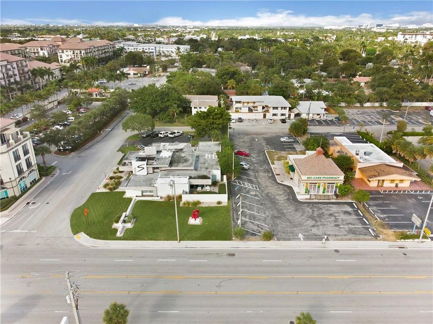 Rarely available, this incredible building designed by Dan Duckham, a local disciple of Frank Lloyd Wright, is on the market. Located in Wilton Manors, the building underwent a meticulous renovation in 2006 by the previous owner & features several trademark Wright-like features, including spiral staircases, glass-enclosed offices, varied ceiling heights, and more. This sale includes two properties 1401 with a building with Approx. 5,800 SF of space inc. 14 offices, 2 conf. rooms, library, reception, terrace/garden, kitchen, 3 bathrooms, and 1409 with a small building of 1,680 SF (Property is rented). These properties provide high visibility with a location just East of five points, with direct exposure on NE 26TH St.