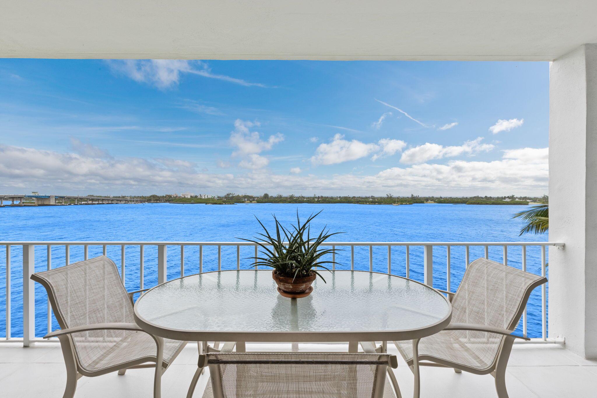 100ft of direct unobstructed water views in the most up and coming county in the nation. Private deeded beach access, This corner unit expansive, sunset views and generously sized bedrooms, each with its own private balcony. The Cove has recently undergone extensive renovations, blending modern amenities with the timeless charm of coastal living. Enjoy private, deeded beach access just across the street, with the exclusive Four Seasons hotel right next door.