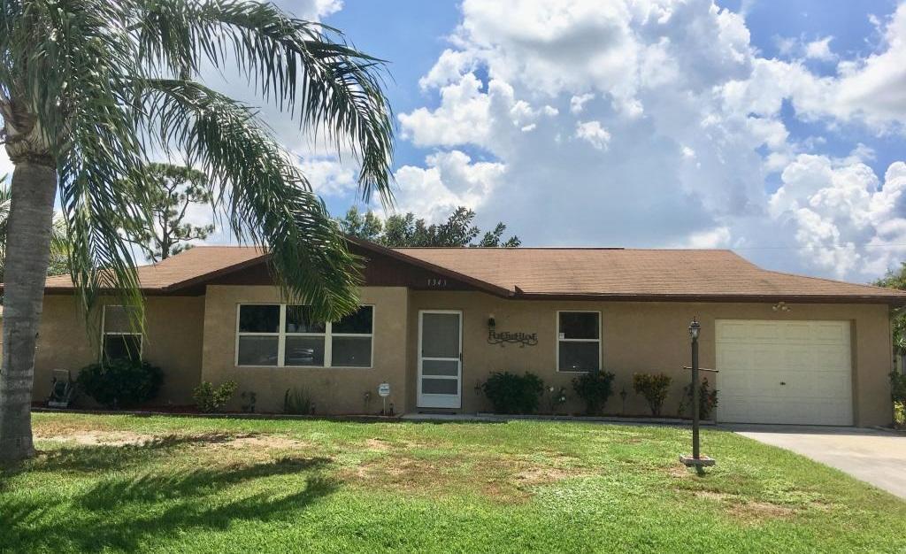 Photo of 1343 SW Hibiscus Street, Port Saint Lucie, FL 34983 (MLS # R11006390)