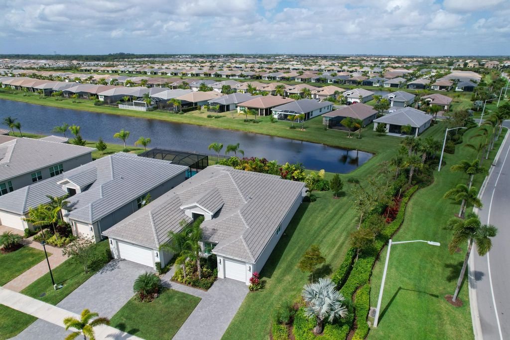 Photo of 11970 SW Sailfish Isles Way SW, Port Saint Lucie, FL 34987 (MLS # R10778061)