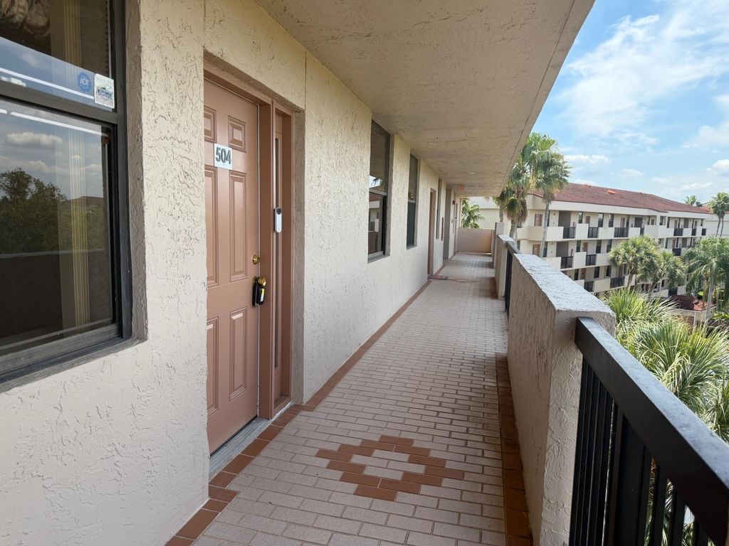 Photo of 2766 S Carambola Cir Circle S #504, Coconut Creek, FL 33066 (MLS # B26007348)