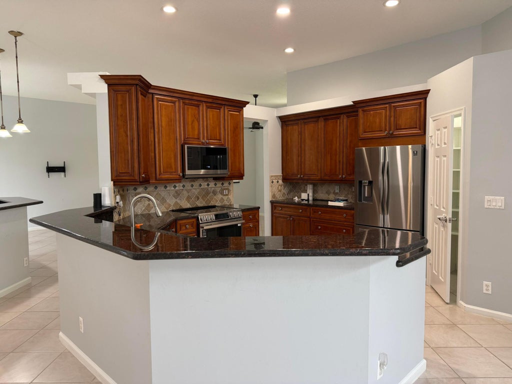 Photo of 10018 NW 56th Court, Coral Springs, FL 33076 (MLS # B26011159)