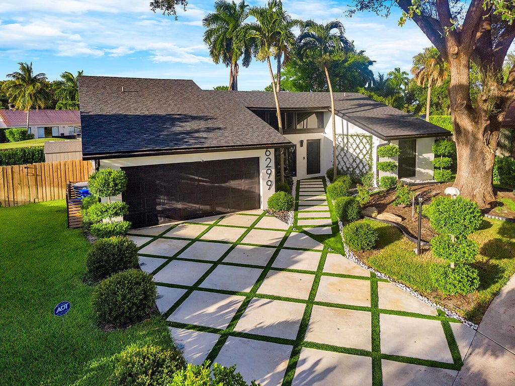 Photo of 6299 Hollandaire Drive E, Boca Raton, FL 33433 (MLS # B26066776)