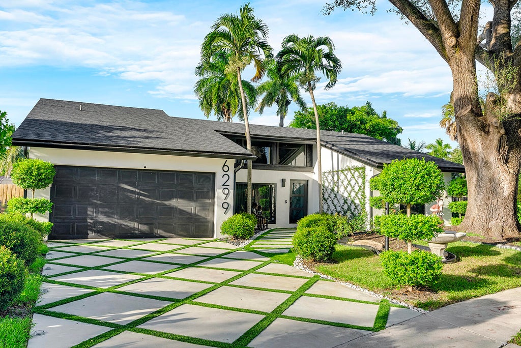 Photo of 6299 Hollandaire Drive E, Boca Raton, FL 33433 (MLS # B26066776)
