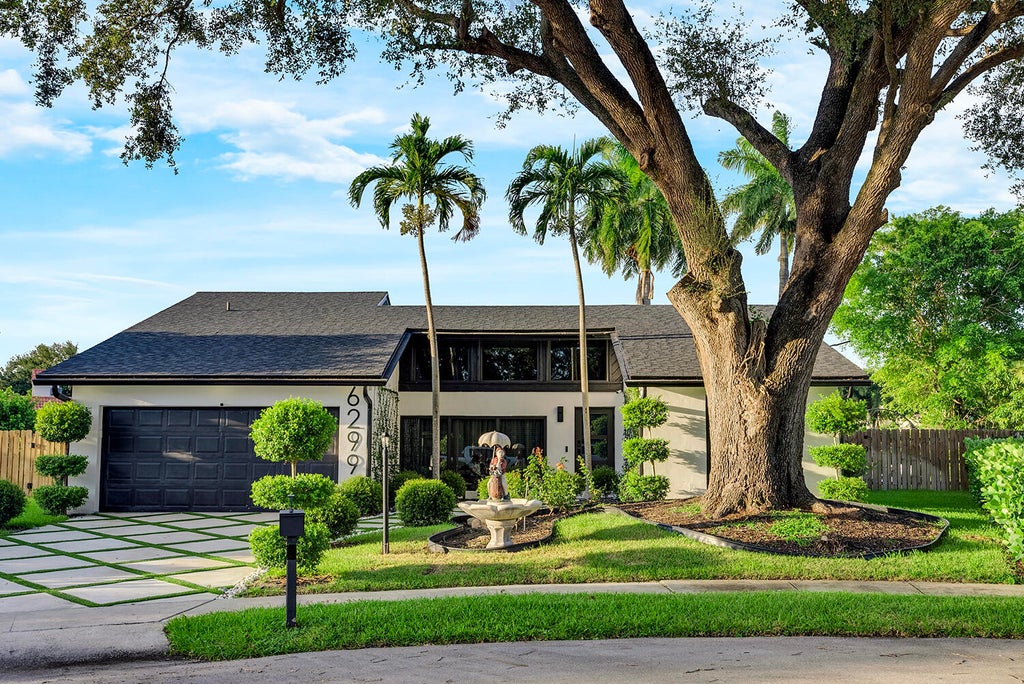 Photo of 6299 Hollandaire Drive E, Boca Raton, FL 33433 (MLS # B26066776)
