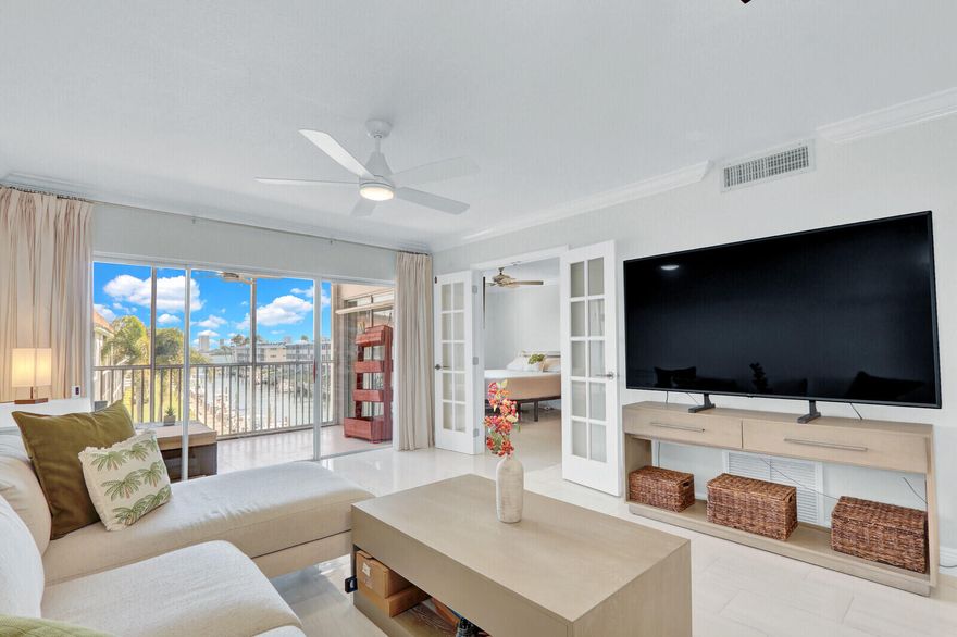 Enjoy stunning water views from this top floor one bedroom condo featuring a bright, open layout with polished Brazilian porcelain tile throughout.  Well maintained and move-in ready. This exclusive residence is only a 24-unit building. The all-ages community offers  a private pool, an elevator and assigned parking. Spacious kitchen offers ample counter space, ideal for entertaining. Relax and watch boats pass by from your large screened balcony. Impact windows and accordion shutters provide peace of mind. Building concrete restoration has been completed and milestone inspection passed. Recent upgrades include a 2021 A/C. Prime North Palm Beach location just minutes to beautiful beaches, golf, shopping and dinning. Approximately 15 minutes drive to Palm Beach International Airport. Approximately 15 minutes drive to Palm Beach International Airport. Roof is asphalt/fiberglass shingle. It was replaced in 2010. Roof sealant applied in June 2022 and has a 12 year warranty.