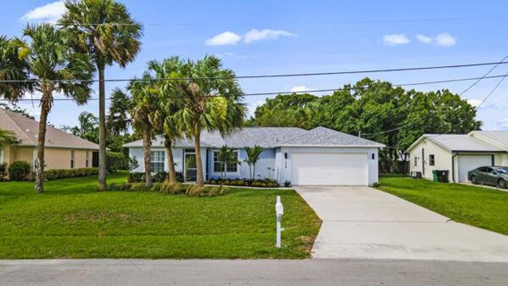 Photo of 1648 SW Ocean Cove Avenue, Port Saint Lucie, FL 34953 (MLS # R10999355)
