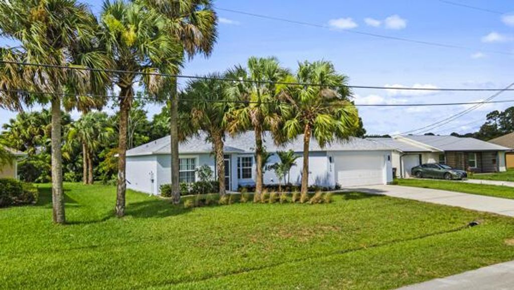 Photo of 1648 SW Ocean Cove Avenue, Port Saint Lucie, FL 34953 (MLS # R10999355)