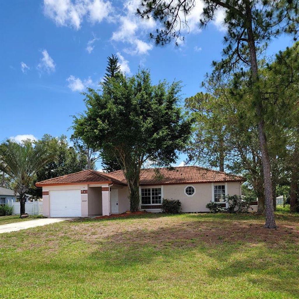 Photo of 3397 SW Potts Street, Port Saint Lucie, FL 34953 (MLS # R10803076)