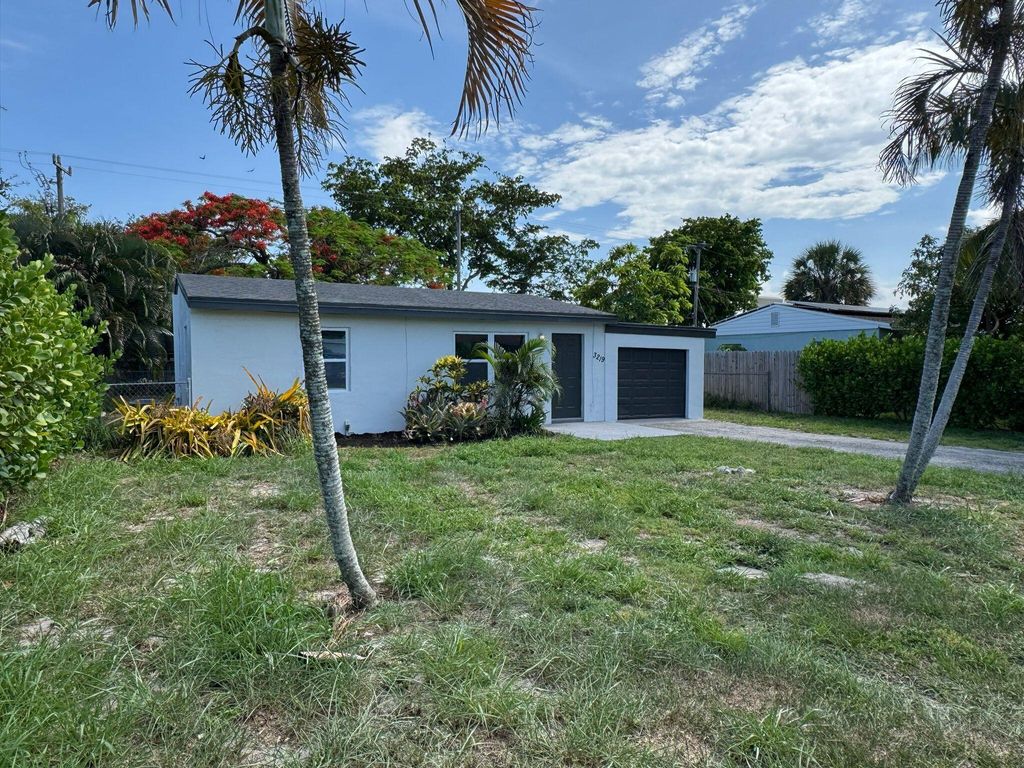 Photo of 3219 Vassallo Ave, Lake Worth, FL 33461 (MLS # R11095067)