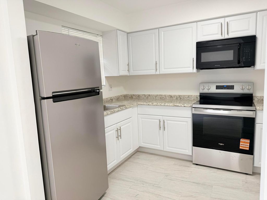 Photo of 1403 Wharf Lane, Greenacres, FL 33463 (MLS # R11150638)