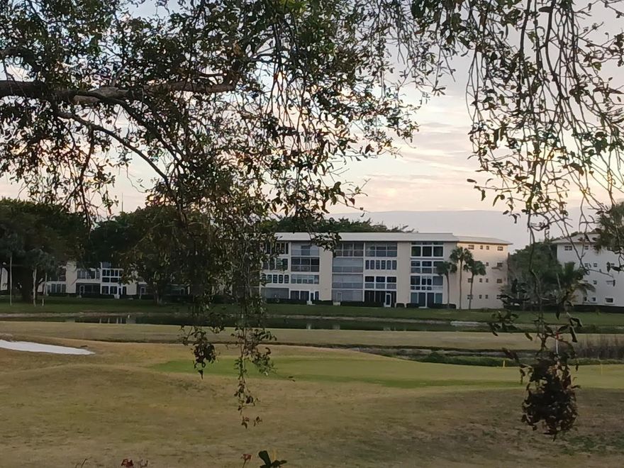 This fully renovated unit has captivating water vistas from its IMPACT glass-enclosed Florida Room, IMPACT WINDOWS & FRONT DOOR. Enjoy the spacious, open floor plan with abundant natural light. Open pass-thru and entryway. Quartz counters with Waterfall edge. SS Appliances, Custom Window Treatments. The bedrooms and bathrooms have been tastefully updated CUSTOM CLOSETS & DOORS. The master bathroom entry moved with barn doors. All SMOOTH CEILINGS with four ceiling fans. SHOWERS IN BOTH BATHROOMS (NO TUB), and the kitchen is a chef's dream. Master bedroom King-size bed. Large flat-screen TV in the living room. Enjoy the peaceful, serene Panoramic water and golf view. Great location & very quiet. Condo is completely furnished and is Turnkey 55+Good income and credit required