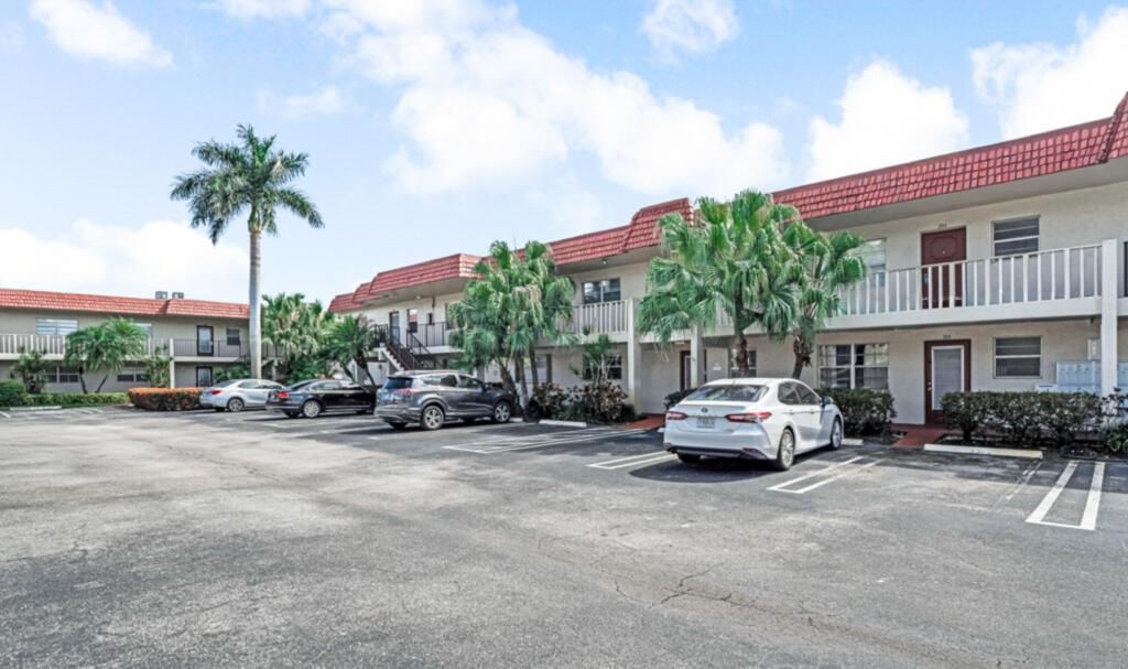 Photo of 33 Abbey Lane #103, Delray Beach, FL 33446 (MLS # R11141076)