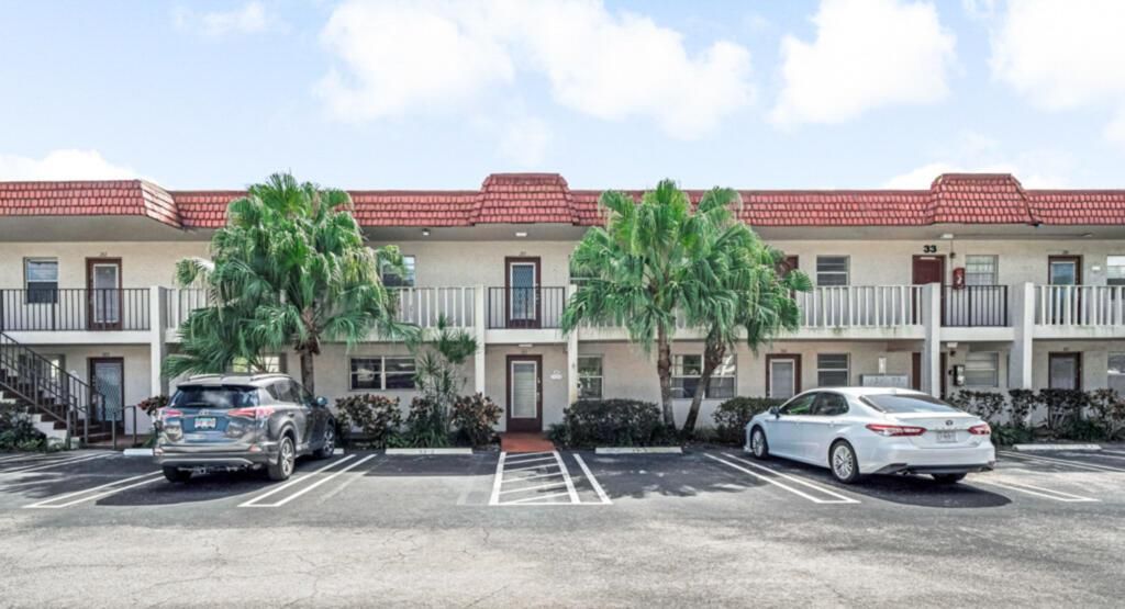 Photo of 33 Abbey Lane #103, Delray Beach, FL 33446 (MLS # R11141076)
