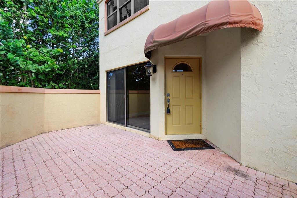 Photo of 41 Uno Lago Drive, Juno Beach, FL 33408 (MLS # R11093705)