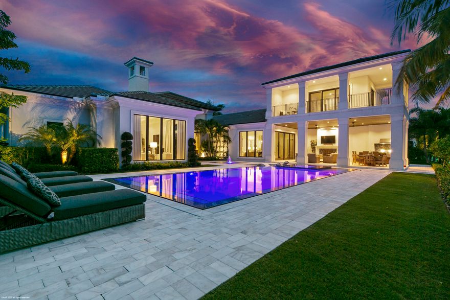 Stunning Custom Bentley floor plan on very desirable 1/2 acre home site with gorgeous golf and lake view.  This incredible estate boasts a formal living room with custom fireplace, custom wine wall fit for any wine enthusiast, light and bright kitchen with top of the line appliances, custom cabinets & quartz counter tops.  The theater room is perfect for watching a new release on a Friday night with the family.  Guests will be spoiled in the VIP guest suite featuring a morning 
bar, expansive wrap around terrace and views of paradise. Working from home won't be an issue as this home features a handsome office with custom built ins & large windows for natural lighting.  The luxurious owner's suite features his and her walk in closets and spa like bathrooms, a pretty sitting area with fabulous views of the tropical backyard, lake and golf course.  Featuring both formal and informal living and dining areas makes this estate home perfect for entertaining!  
Other features- whole house generator, smart home technology, motorized screens on the patio.