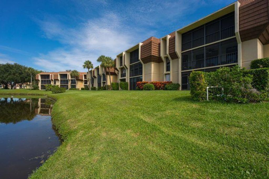 Photo of 5250 Woodland Lakes Drive #131, Palm Beach Gardens, FL 33418 (MLS # R10778358)