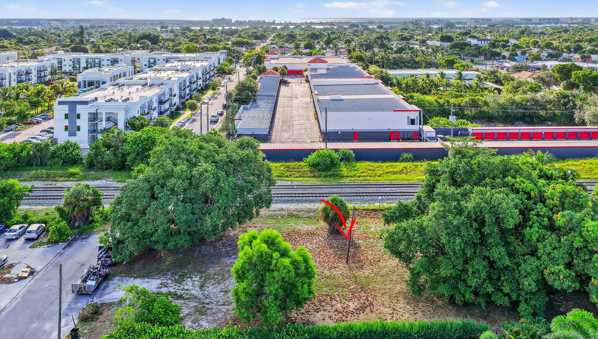 Calling all investors and builders! This exceptional high-elevation property sits east of I-95, offering an incredible location. Enjoy close proximity to the beach, shopping, groceries, medical facilities, and vibrant entertainment options--everything you need just minutes away. This large, deep lot boasts a mature mango orchard, providing both charm and potential for creative landscaping or outdoor living. With NO HOA, you'll have the freedom to design and build without unnecessary restrictions. Whether you envision a custom dream home or a lucrative development project, this North Lake Worth location offers a rare opportunity to create something truly special. Come see it today!