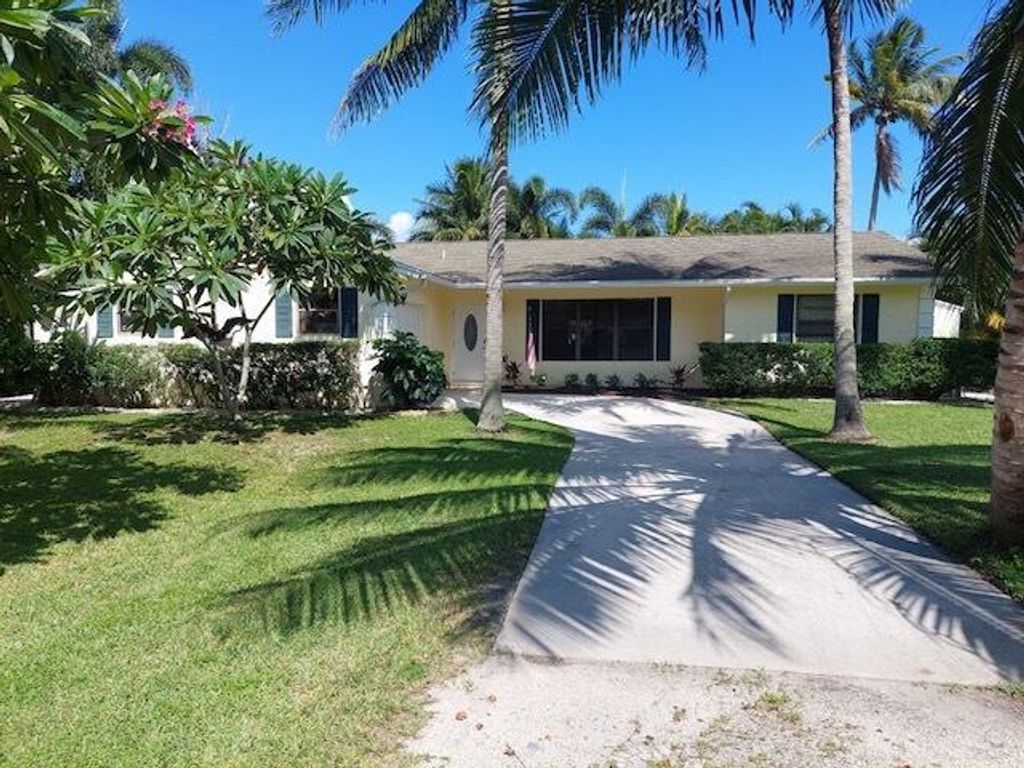 Photo of 6568 Rigger Road Rd, Lake Worth Beach, FL 33462 (MLS # R10728312)
