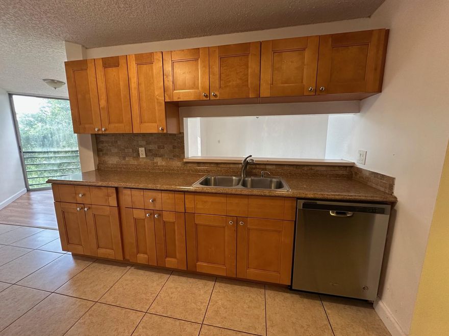 Don’t miss this opportunity to live in this very spacious 2-bedroom, 2 full-bath apartment in the heart of Sunrise close to everything you need! Enjoy a relaxing fourth-floor location with elevator access, no upstairs neighbors, & no street or parking noise. This bright & airy unit offers extra living space, as the balcony has been incorporated into the interior, allowing for tons of natural light throughout. The large kitchen features abundant wood cabinetry & generous counter space. Oversized primary bedroom boasts ample closet space, including a large walk-in closet. Master bathroom offers double sinks, a separate shower, & toilet area for added comfort. A convenient washer/dryer combo in unit plus additional laundry facilities are available on each floor. HOA approval is required.