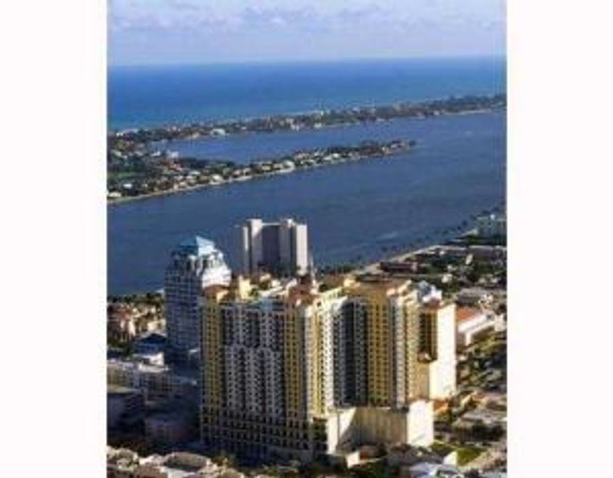 BEAUTIFUL CONDO FEATURING 10' CEILINGS, EUROPEAN-STYLE WOOD CABINETRY WITH GRANITE COUNTER TOPS, STAINLESS STEEL APPLIANCE PACKAGE, A SPACIOUS MASTER SUITE WITH AN OVERSIZED BATHTUB AND MARBLED BATH. RENT IN PURE LUXURY AT TWO CITY PLAZA. RESIDENTS CAN ENJOY 24 HOUR SECURITY, CONCIERGE, VALET PARKING, HEATED ROOFTOP SWIMMING POOL OVERLOOKING THE OCEAN, INTRA-COASTAL AND CITY, 2 STORY METROPOLITAN-STYLE GRAND LOBBY, STEAM ROOM, SAUNA, EXPANSIVE SUN DECK, FITNESS CENTER, MESSAGE THERAPY ROOMS, LUSHLY LANDSCAPED FORMAL GARDENS, COVERED ENTERTAINMENT AREAS, UPSCALE CLUB ROOM AND THEATER FOR ENTERTAINING AND A MOONLIT THEATER. WASHER/DRYER IN THE UNIT. CABLE, INTERNET AND ELECTRIC INCLUDED IN MONTHLY RENT!