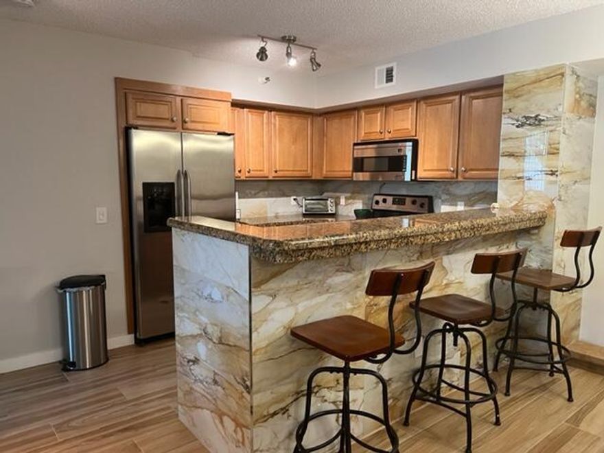 SHORT TERM FULLY FURNISHED 2 bedroom 2 baths available for seasonal rental or off season. 2ND FLOOR ( no elevator) Steps away to the club house, with views of the water fountain. Upgraded kitchen with granite countertops, and newer kitchen cabinets. At resort Style Gated Yacht Club on the Intracoastal *** Tenants are to pay 13% taxes on rentals of a term of 6 months or less***Minimum term of 4 months to rent this unit*** RENT AMOUNT VARIES DEPENDING ON THE TERM.