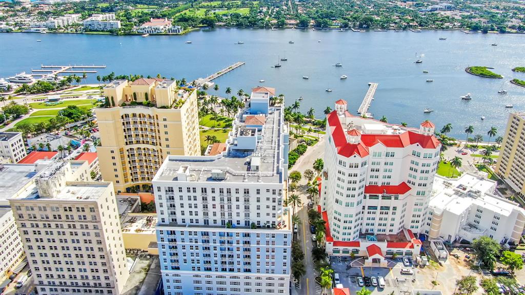 Direct East View!! Two parking spaces. The second you open the front door your view is the Intracoastal and Palm Beach Island. Brand new kitchen, wood floors and updated bathrooms. New carpet in both bedrooms will be installed before move in. Wood floors in the living area and kitchen.