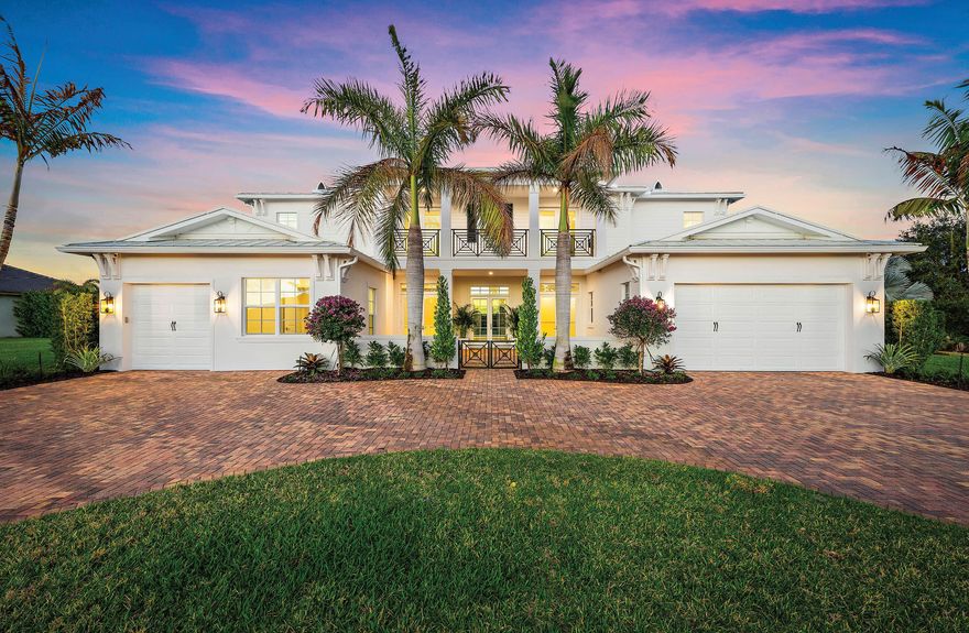 This is a rare opportunity to own what may be the finest home in one of Jupiter's most beloved communities. Completely renovated  with no expense spared and never lived in since completion, this exceptional Wentworth model in Prado offers 6,254 square feet  under air and features the highly desirable coastal elevation. Perfectly positioned on arguably one of the best lots in the neighborhood, the one-acre property enjoys eastern exposure and backs  up to a peaceful preserve with tranquil, expansive views, creating a private setting with only one neighboring home. The open floor plan showcases extraordinary craftsmanship and design, offering five bedrooms, six full baths, and two half baths,  along with a formal dining room, private office, a spectacular two-story family room  filled with natural light, and a bonus room  that could serve as either a club room or a kids' playroom. The brand-new chef 's kitchen features custom cabinetry, Sub-Zero and Wolf appliances, and a herringbone zellige backsplash,  thoughtfully designed for both functionality and style. Throughout the home are wide-plank European oak floors, all-new 9-foot solid wood interior doors with high-end hardware, and  eight fully renovated bathrooms—each with its own character while maintaining a cohesive aesthetic. High-end wallpaper and  extensive custom woodwork add warmth and architectural detail throughout. Upstairs, the expanded owner's suite offers a luxurious retreat with dual walk-in closets and a spa-inspired bath featuring a  soaking tub, glass shower, and dual vanities. Three additional bedrooms include en-suite baths and built-in closets, while an  upstairs loft and balcony overlook the family room and capture beautiful pool and preserve views. Outdoor living is equally impressive, with an expanded covered lanai, travertine decking, and a saltwater heated pool with sun  shelf and spa, surrounded by all-new professional landscaping for ultimate privacy. Exterior pavers and patios have been profes sionally sealed to enhance both durability and appearance. Located in the family-friendly gated community of Prado, this estate offers luxury living on over an acre while remaining just  minutes from Jupiter's beaches, dining, shopping, and everyday conveniences.
