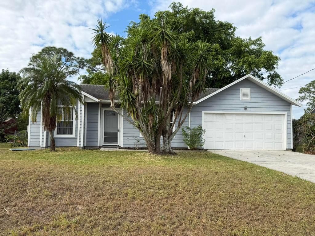 Photo of 2342 SW Bayshore Boulevard, Port Saint Lucie, FL 34984 (MLS # R11155437)