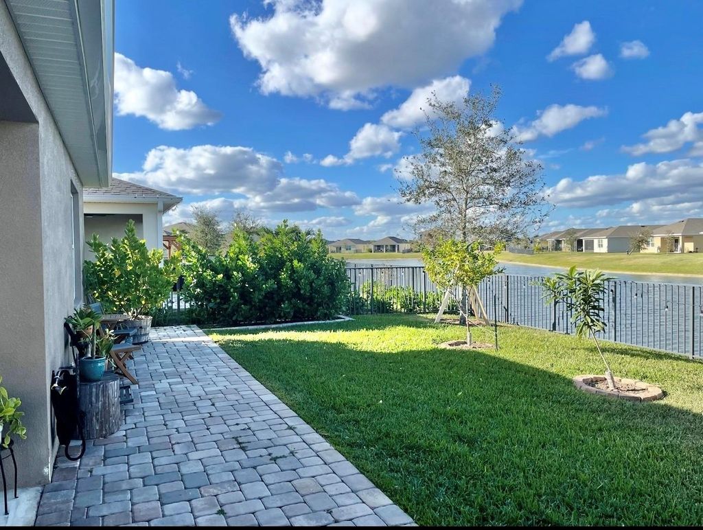 Photo of 10975 SW Pacini Way, Port Saint Lucie, FL 34987 (MLS # F10474698)