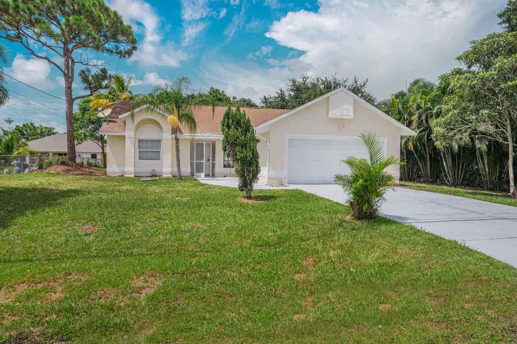 Photo of 2871 SE Hutchings Avenue, Port Saint Lucie, FL 34952 (MLS # R11084053)