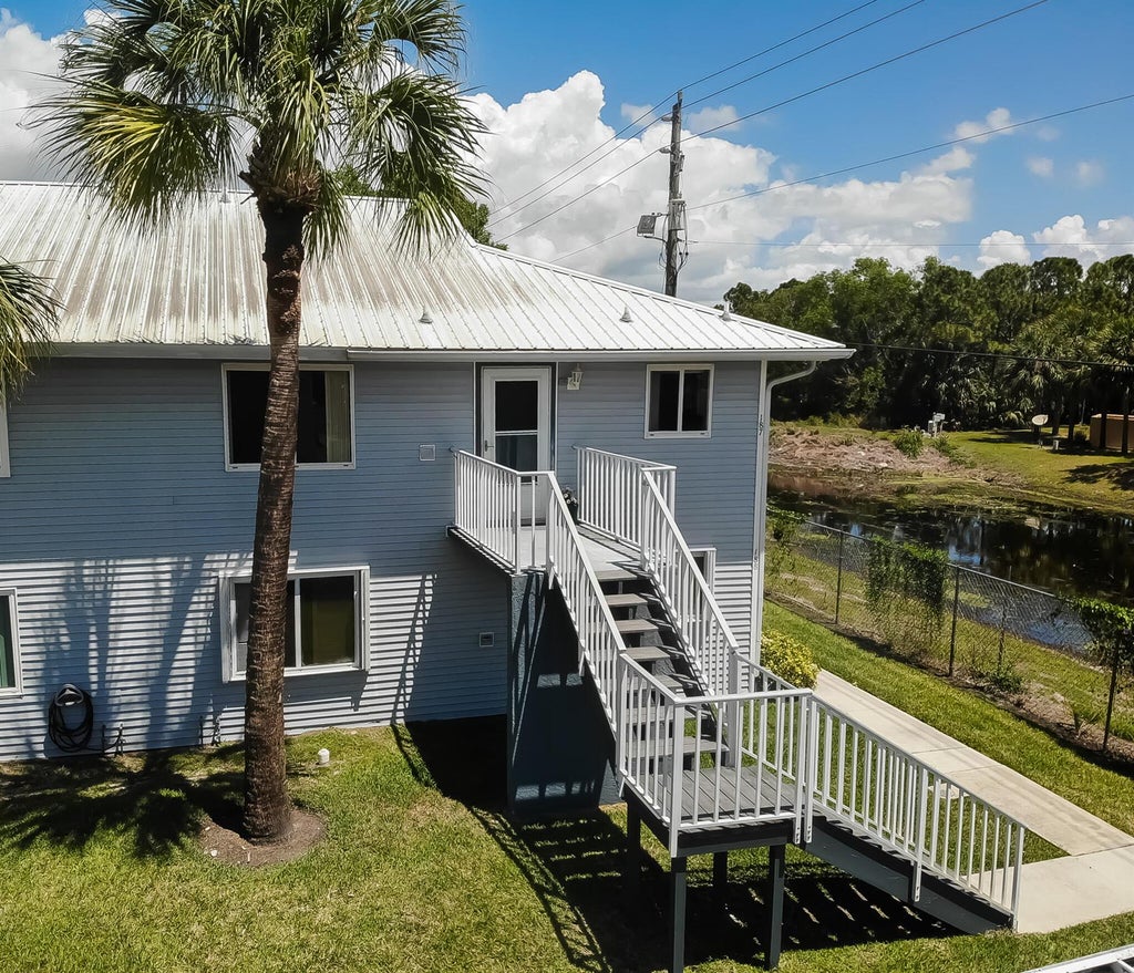 Photo of 187 SE Village Drive #187, Port St Lucie, FL 34952 (MLS # R10883563)