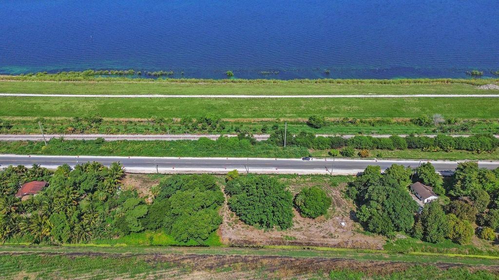 Photo of 14754 Us Highway 441, Canal Point, FL 33438 (MLS # R10987046)