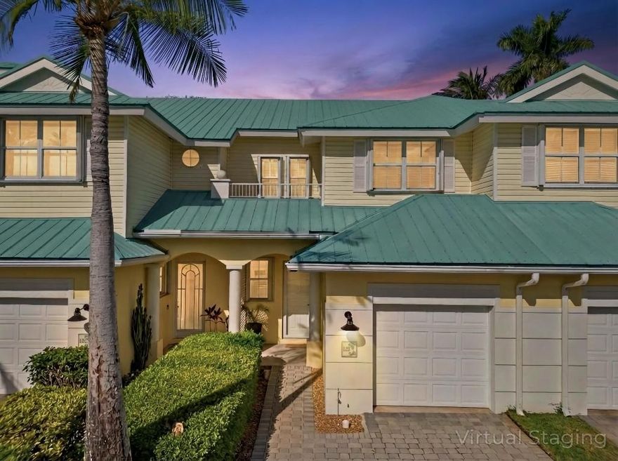 GATED TURN-KEY COASTAL RETREAT IN BAREFOOT COVE Stunning Key West-inspired waterfront community townhome, just ~2 miles to the beach. This remodeled residence with upgraded floors, kitchen, bathrooms and much more offers a bright open layout with high ceilings and oversized slides. The designer kitchen w/granite/marble counters, custom cabinetry, stainless steel appliances and wine chiller flows into generous living areas. Featuring 2 beds + 2.5 baths, including a spacious primary suite with oversized walk-in closets, dual sinks and separate tub/shower. Enjoy a private patio perfect for outdoor living. One-car garage and extra driveway parking. Storm/accordion shutters, alarm system and more. HOA includes building, grounds maintenance, wind and flood insurance, gated security and pool