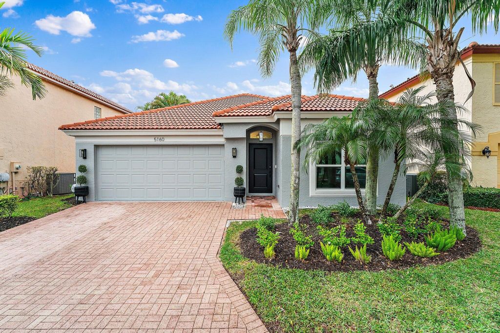 Photo of 5160 Elpine Way, Riviera Beach, FL 33418 (MLS # R10966520)