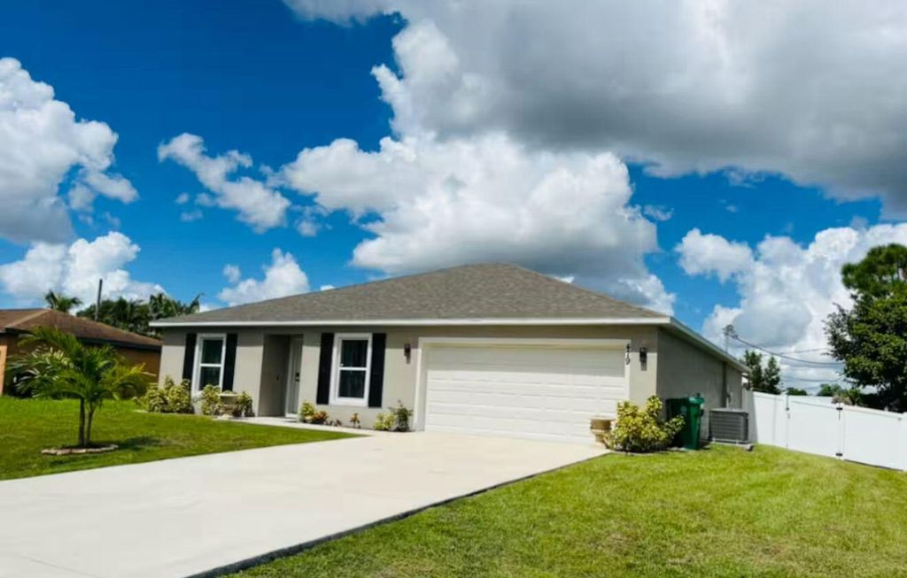 Photo of 479 SW Holden Terrace, Port Saint Lucie, FL 34984 (MLS # R11088776)