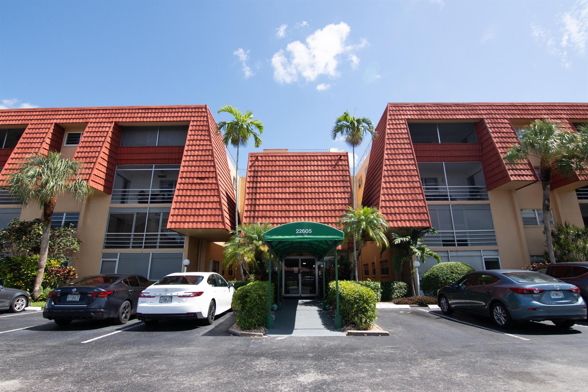 Spacious 1 bed, 1.5 bath first-floor condo in a desirable West Boca Raton location, within the well-maintained Boca Club community. This unit offers a sunny southern exposure and a comfortable layout with central A/C. The kitchen features stainless steel appliances and white cabinetry, leading into an open living and dining area that flows to a private, covered screened-in patio. The extra-large primary bedroom includes a generous walk-in closet and an en-suite bath. One exterior parking space included! Boca Club features a secured lobby, heated pool, and tennis court, and is conveniently located near West Boca Medical Center, shopping, dining, and major roadways. A great value in a highly sought-after area.