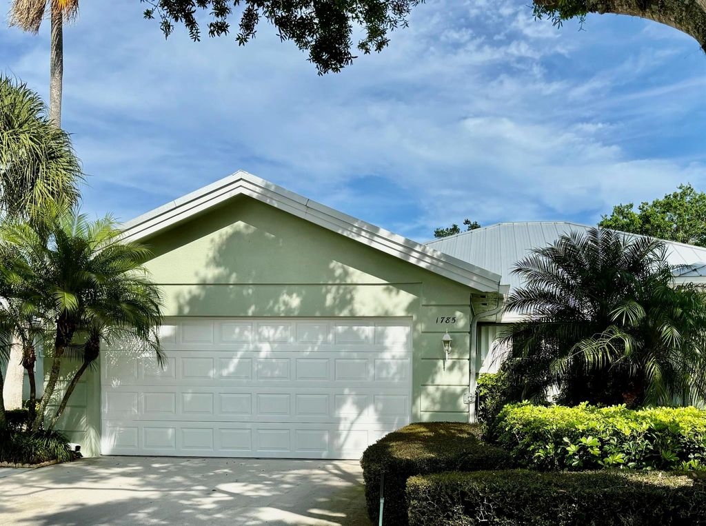 Photo of 1785 SW Waterfall Boulevard, Palm City, FL 34990 (MLS # R10958909)