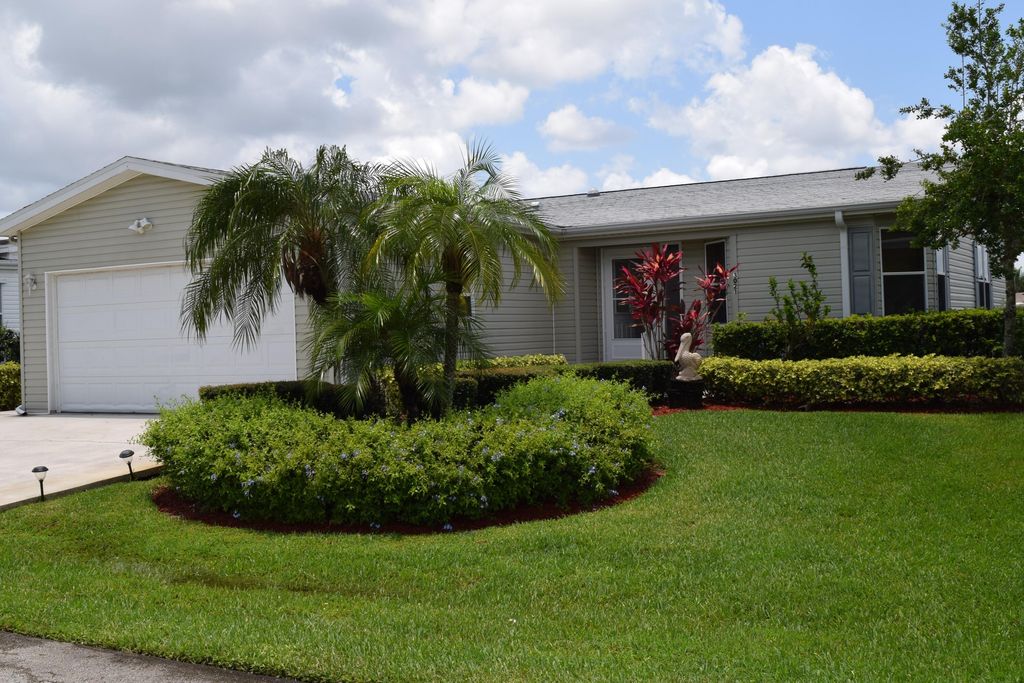 Photo of 3021 Five Iron Drive, Port Saint Lucie, FL 34952 (MLS # R10807837)