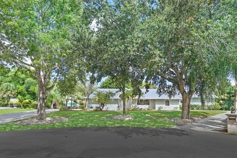 Photo of 1225 SW Magnolia Bluff Drive, Palm City, FL 34990 (MLS # R11128271)