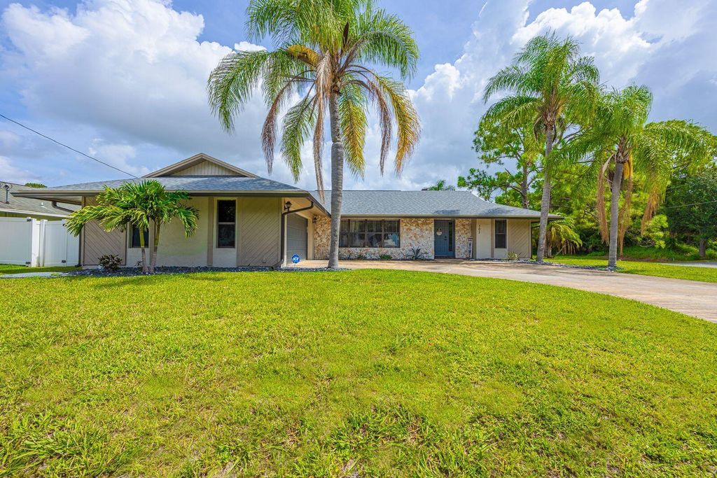 Photo of 101 SW Chapman Avenue, Port Saint Lucie, FL 34984 (MLS # R11105687)