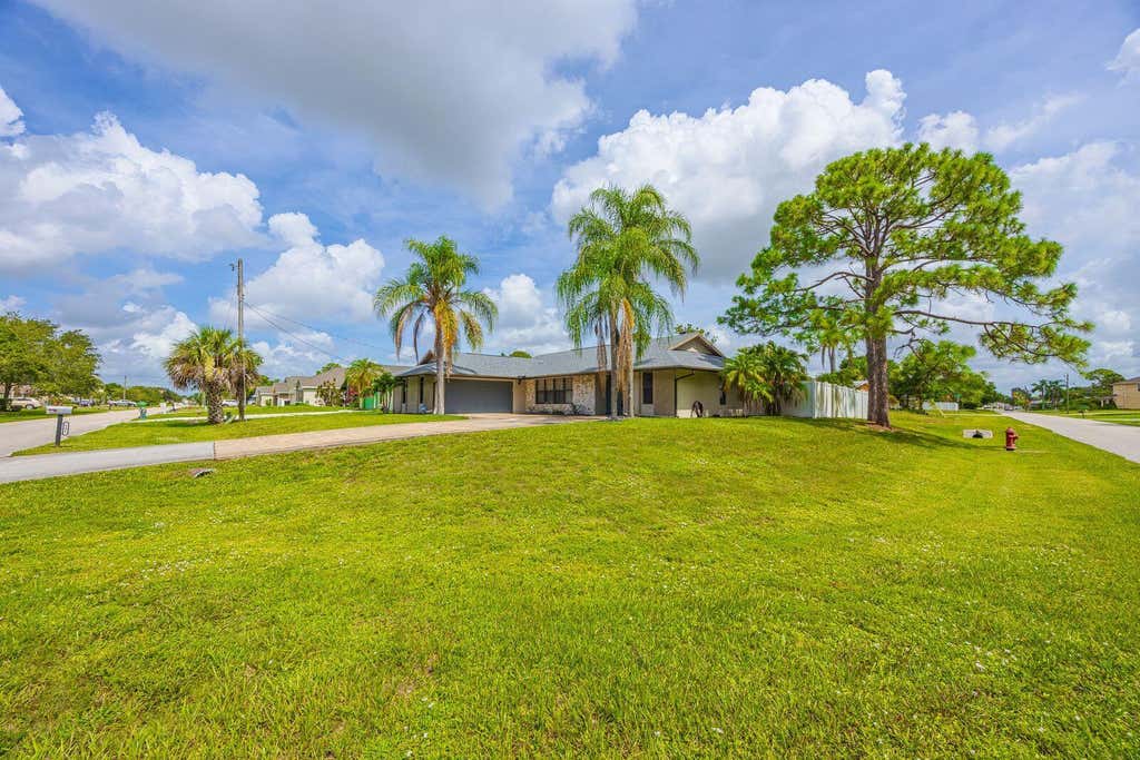 Photo of 101 SW Chapman Avenue, Port Saint Lucie, FL 34984 (MLS # R11105687)