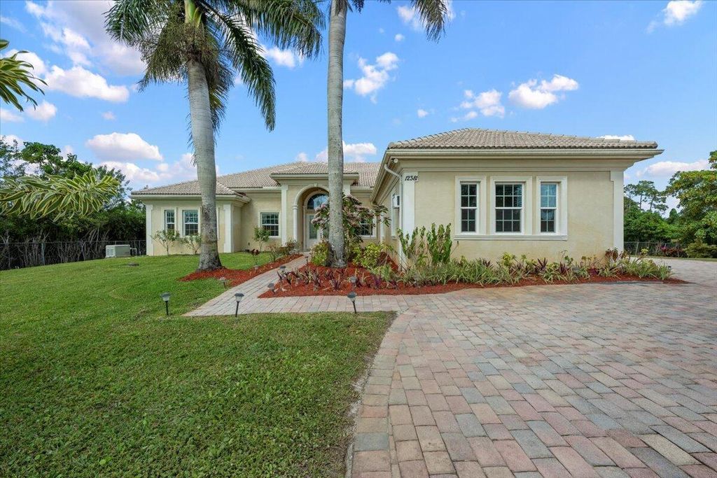Photo of 12381 152nd Street N, Jupiter, FL 33478 (MLS # R11062609)