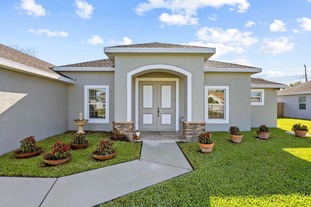 Photo of 1843 SW Hudson Street, Port Saint Lucie, FL 34953 (MLS # B26009883)