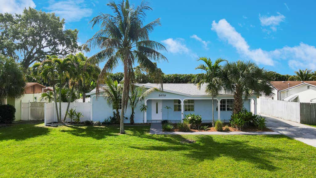 Photo of 2070 NW Sunset Boulevard, Jensen Beach, FL 34957 (MLS # R10969218)