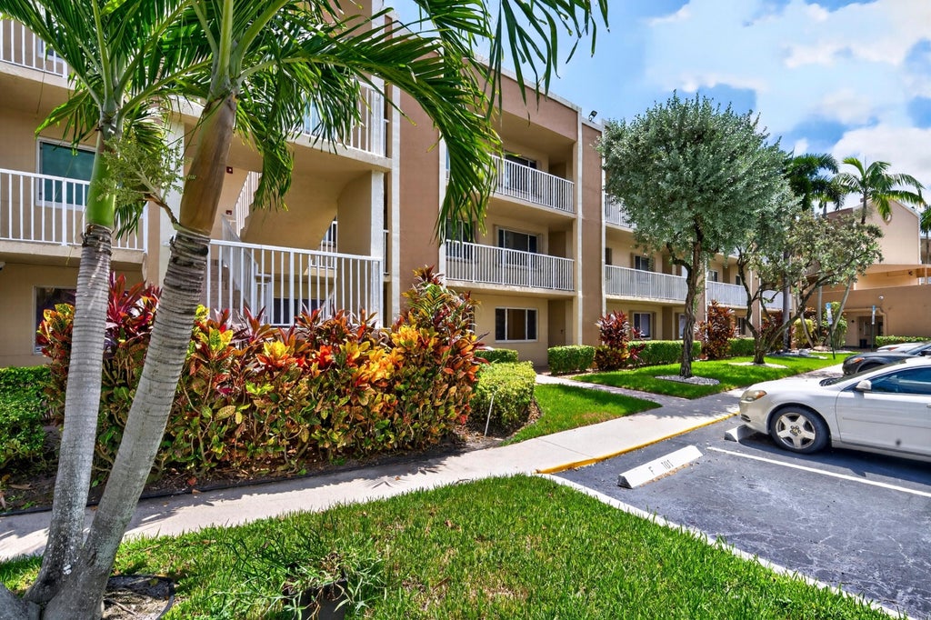 Photo of 7348 N DEVON Drive #203, Tamarac, FL 33321 (MLS # B26071708)