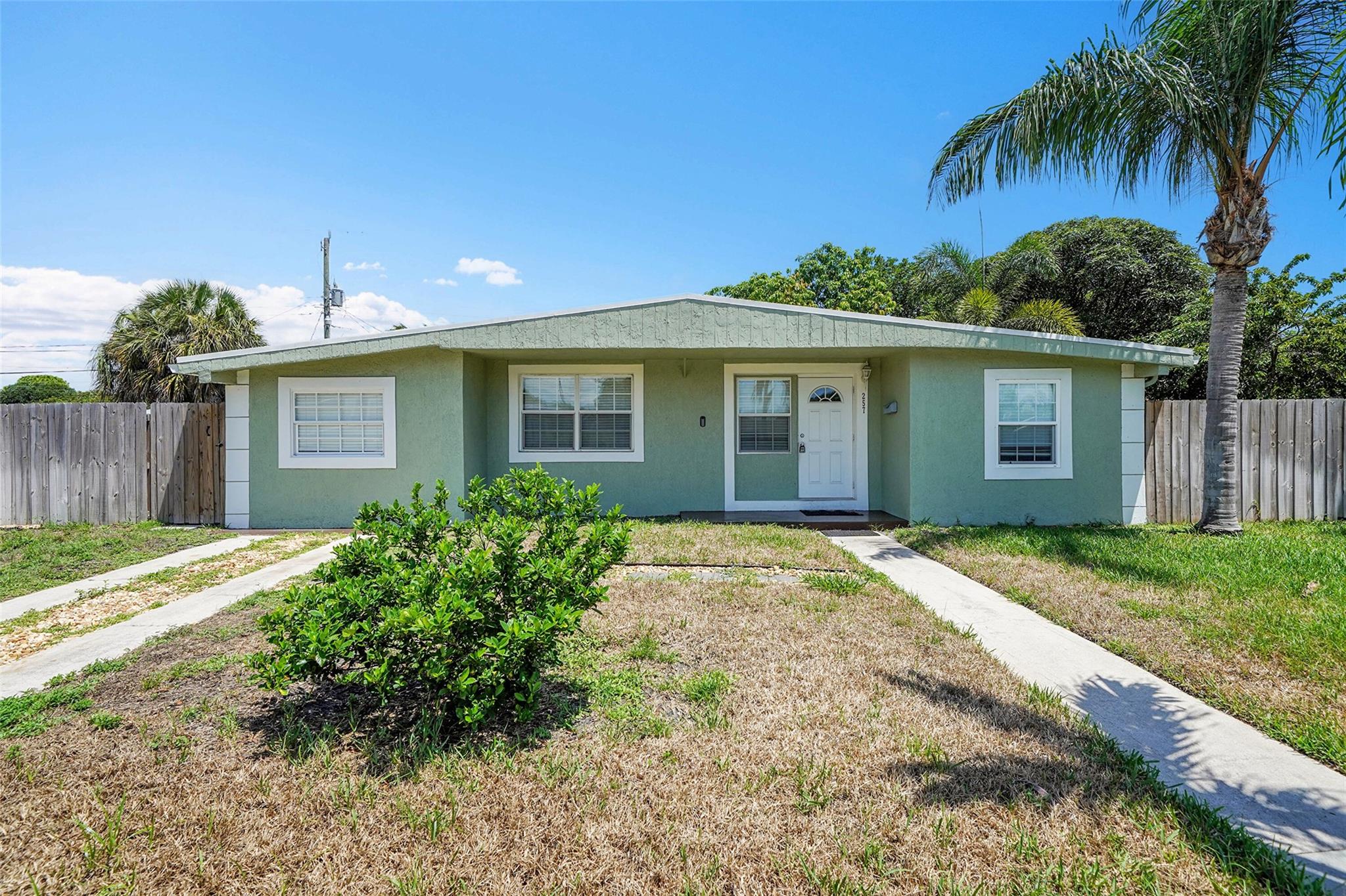 Welcome to this charming 4-bedroom, 1-bathroom home in the heart of Deerfield Beach! Ideally located near shopping, dining, and easy freeway access, this home offers both convenience and comfort. Inside, you’ll find a wonderful living room & a spacious family room perfect for entertaining. The beautiful kitchen features granite countertops, rich cabinetry, & a skylight that fills the space with natural light. Tile floors flow through the main living areas, while cozy carpeted bedrooms provide a warm retreat. Step outside to enjoy a fully fenced, large backyard with plenty of room to relax or play. An additional outdoor storage room adds extra functionality (note: shed not included for tenant use). The owner will consider a small dog. Don’t miss this opportunity—schedule your showing today!